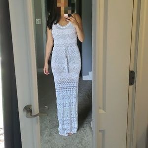 Venus white knit dress with nude underlay.